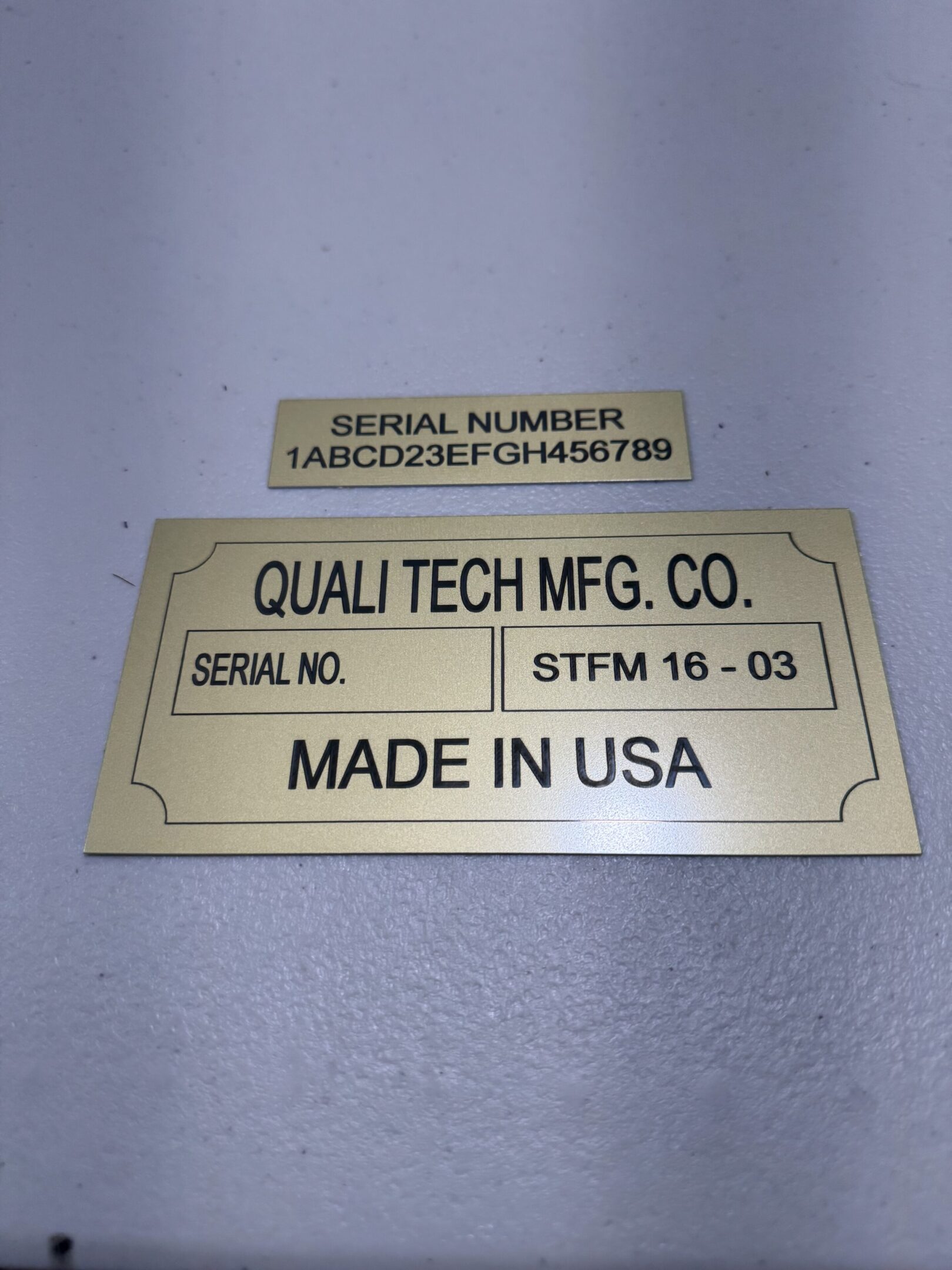 Gold serial and "Made in USA" labels